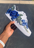 White sneaker with custom blue floral embroidery and royal blue hard bottoms for men and women 