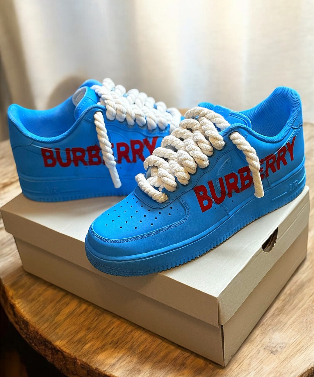 Custom airforce ones Burberry print design with all blue matte finish. 