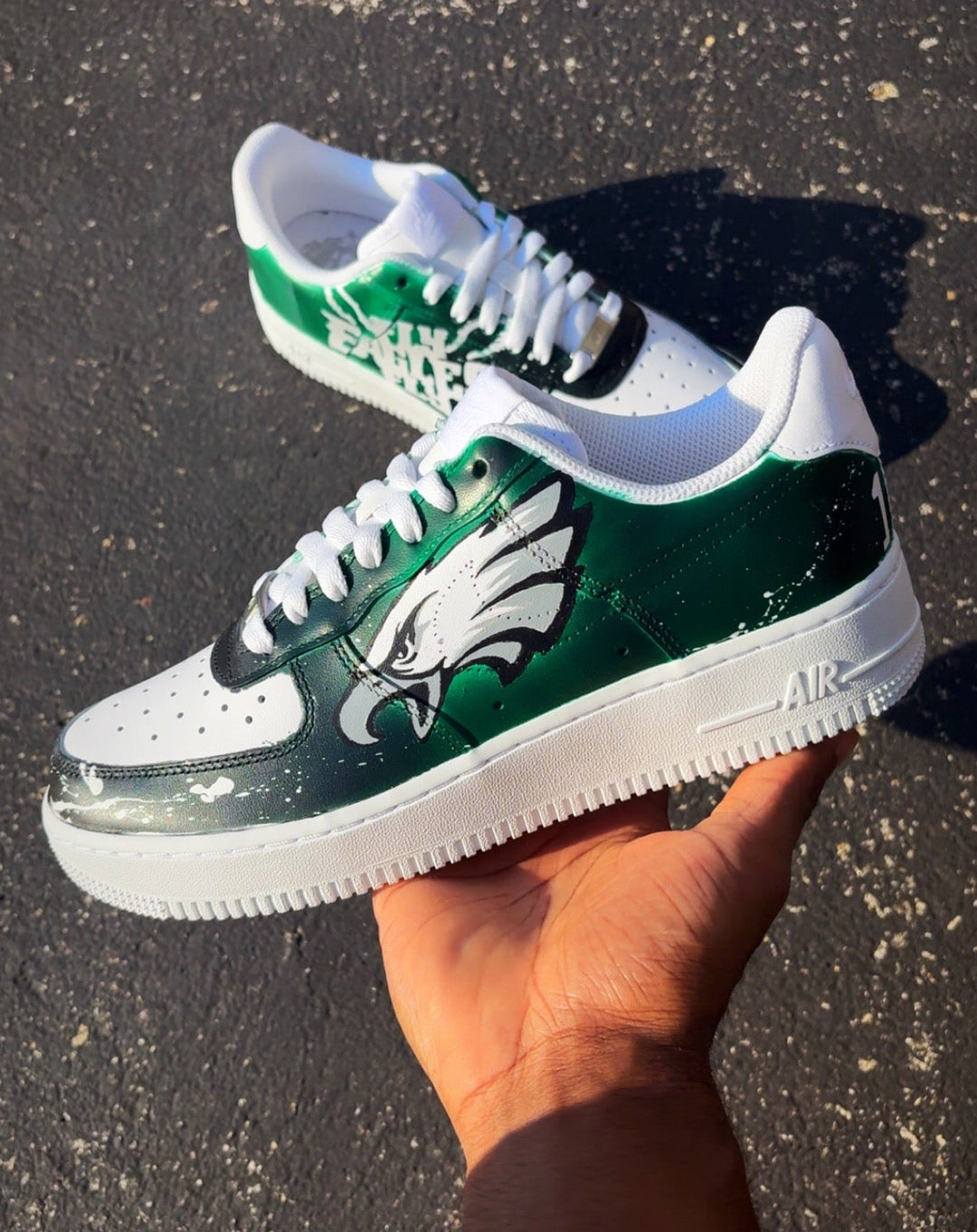 Custom NFL team sneakers with a logo and green and black color fade. Custom team support for men and women 
