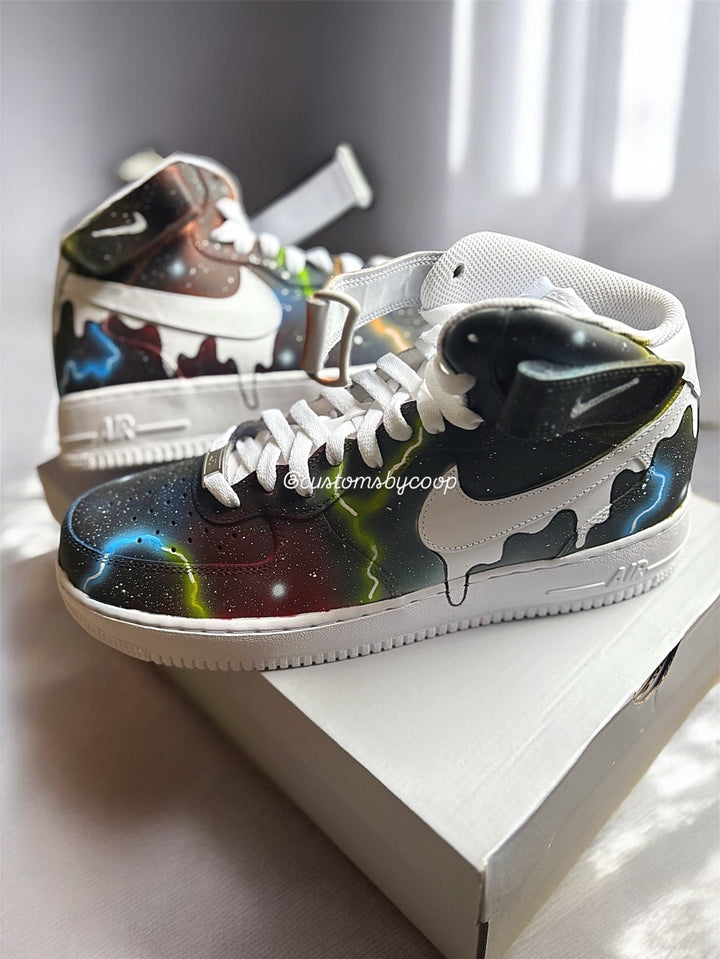 Colorful hightop sneakers with abstract galaxy design on a white Airforce ones. Customs designed for men and women 