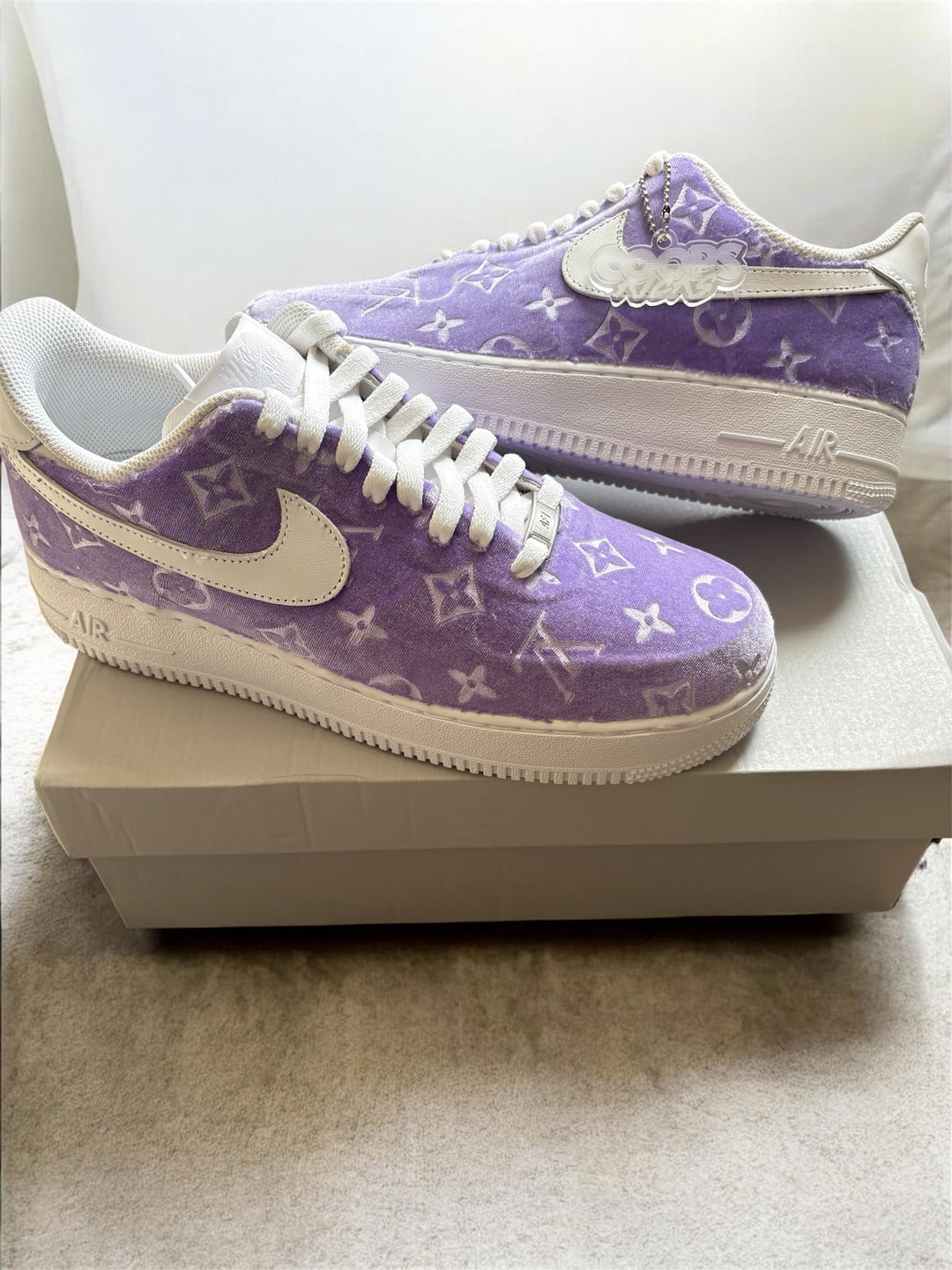 Custom purple airforce one wrapped in purple velvet LV fabric. 