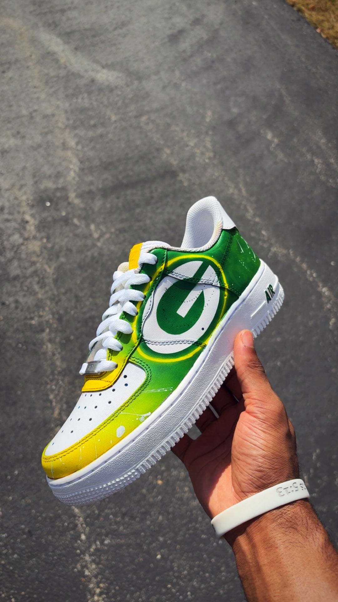 Custom Green and yellow sneaker with a sports team logo. Custom made for men and women 