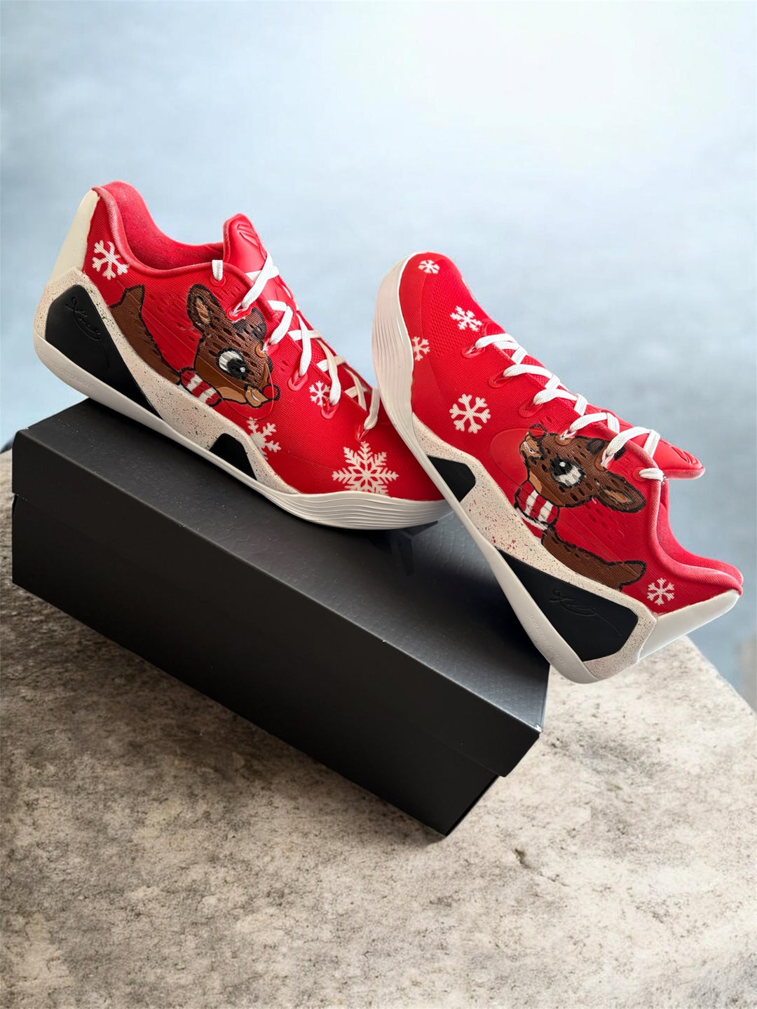 Custom Kobe Christmas themed basketball shoes. Red Kobe 8 Rudolph inspired custom with snow flakes designs 