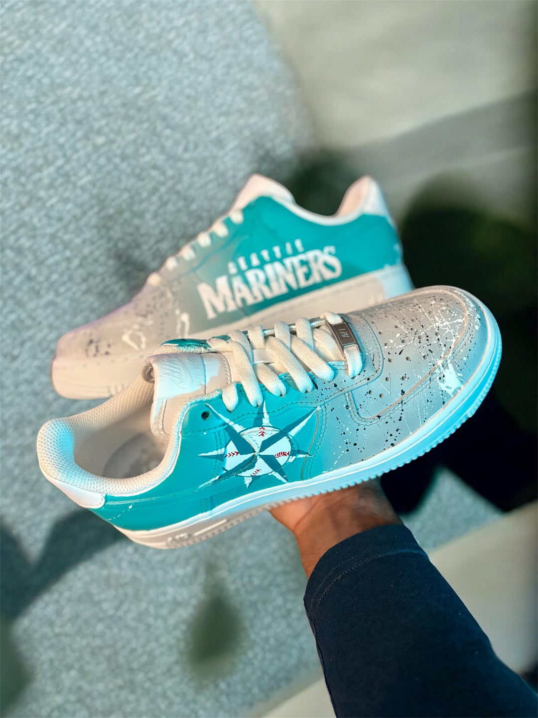 Teal and white custom sneaker with MLB 'Mariners' team color fade for men and women. 