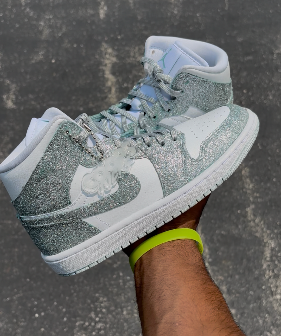 Custom women’s silver high-top sneaker with white accents 