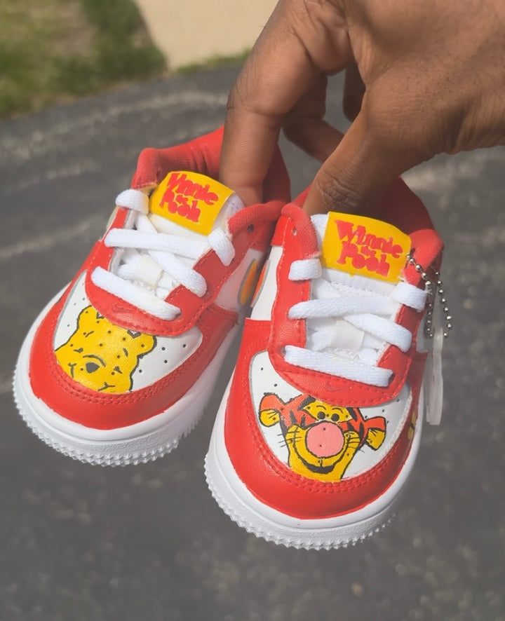 Custom Red outlined sneakers with cartoon character portraits and custom tongue tag 
