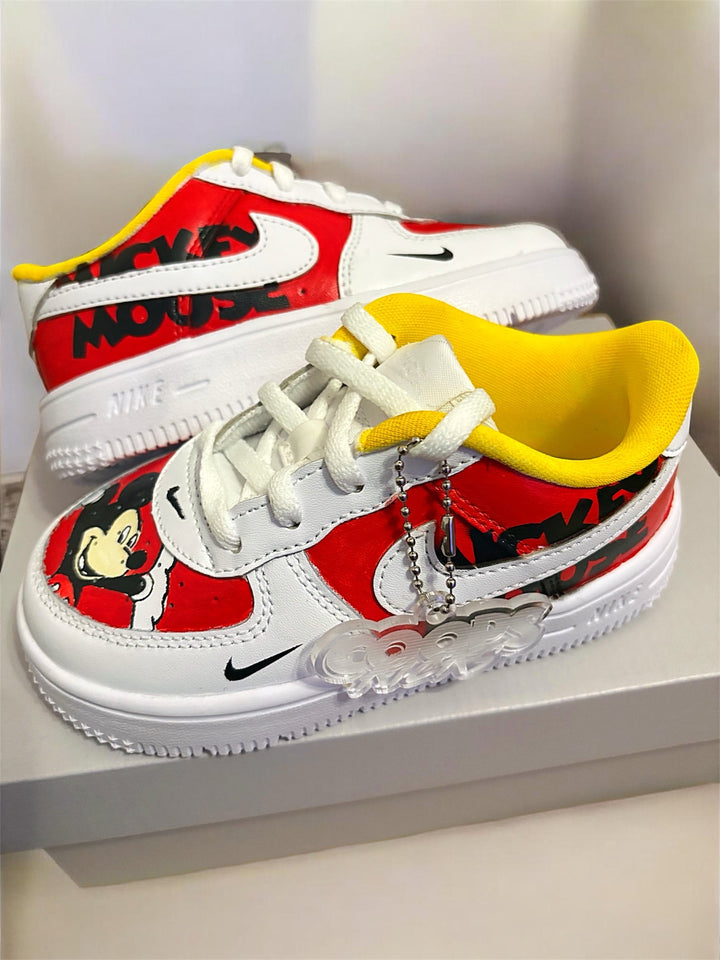Custom red and yellow sneaker with cartoon character portraits 